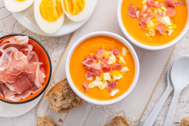 Salmorejo - raw tomato soup with ingredients on a kitchen table Salmorejo - raw tomato soup with ingredients on a kitchen table, spanish cuisine for hot summer Copyright: xZoonar.com IngridxBalabanovax 20479801