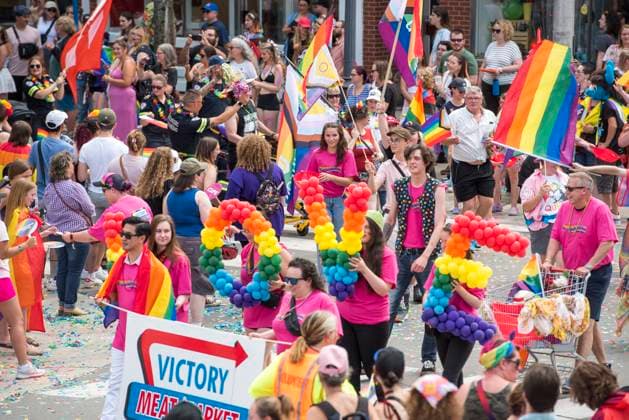July 23, 2023, Fredericton, New Brunswick, CANADA: Participants and the public fill the intersection of Queen and York Streets next to Fredericton city hall during the 11th annual Fredericton Pride parade in Fredericton, New Brunswick on Sunday July 23, 2023. Fredericton CANADA  - ZUMAc35_ 20230723_zaf_c35_044 Copyright: xStephenxMacgillivrayx