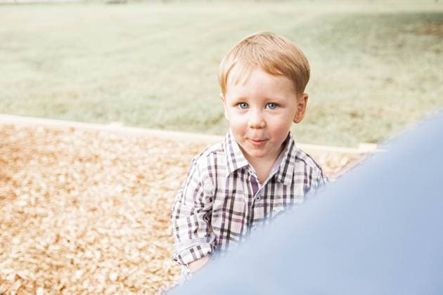 Creative Highlights Symbolbilder Toddler Boy Smiling at Playground Outside Kingsville, Maryland, United States R_KPXG230720-1218720-01 ,model released, Symbolfoto