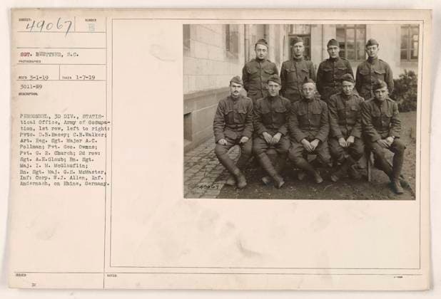 RECORD DATE NOT STATED Personnel of the 3rd Division, Statistical Office, Army of Occupation, pictured in Andernach, Rhine, Germany. Front row (left to right): Pvts. D.B. Racey, C.B. Walker; Art. Reg. Sgt. Major A.C. Pollman; Pvt. Geo. Owens; Pvt. G.R. Church. Second row: Sgt. A.E. Gloub; Bn. Sgt. Maj. I.M. McGlauflin; Bn. Sgt. Maj. G.S. McMasters, Inf.; Corp. W.J. Allen, Inf. Photograph taken by S.C. Buettner on 3-1-19. Copyright: xpiemagsx 971_86704237 !ACHTUNG AUFNAHMEDATUM GESCHÄTZT!