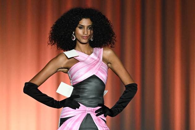 Qatar Fashion United Runway - Doha Dutch fashion model Imaan Hammam walks the runway during the Qatar Fashion United by CR at 974 Stadium in Doha, Qatar on December 16, 2022. Photo by ABACAPRESS.COM Doha Qatar  Copyright: xABACAx 835697_087 ABACAx 835697_087 