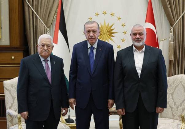 Turkish President Recep Tayyip Erdogan (C) poses for a photo with Palestinian President Mahmoud Abbas (L) and Head of the Hamas Political Bureau Ismail Haniyeh (R) within official meeting at the Presidential Complex Turkish President Recep Tayyip Erdogan (C) poses for a photo with Palestinian President Mahmoud Abbas (L) and Head of the Hamas Political Bureau Ismail Haniyeh (R) within official meeting at the Presidential Complex in Ankara, Turkiye on July 26, 2023. Photo by Turkish presidency apaimages Ankara Ankara Turkey 260723_TURKIYE_TPO_00 Copyright: xapaimagesxTurkishxpresidencyx xapaimagesx