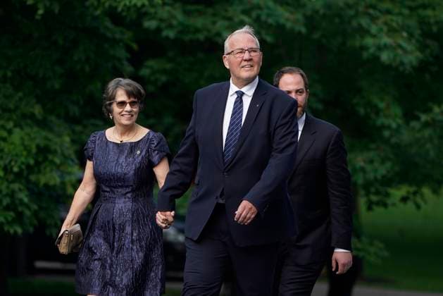 July 26, 2023, Ottawa, ON, Canada: Bill Blair arrives with his family for a cabinet swearing-in ceremony at Rideau Hall in Ottawa on Wednesday, July 26, 2023. Ottawa Canada  - ZUMAc35_ 20230726_zaf_c35_025 Copyright: xAdrianxWyldx