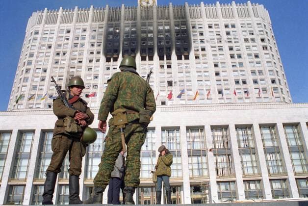 Moscow, Russia. Soldiers stand near the House of Soviets of the Russian Federation, damaged when supporters of the Russian president stormed the building within a standoff between the Supreme Soviet of the Russian Federation and Russian President Boris Yeltsin. Alexander Sentsov, Alexander Chumichev TASS  564910