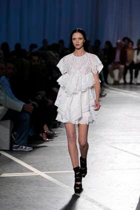 Givenchy Spring-Summer 2010 Ready to wear collection show in Paris Mariacarla Boscono displays a creation by Italian designer Riccardo Tisci for Givenchy Spring-Summer 2010 ready-to-wear collection show held at the Lycee Carnot in Paris, France on October 4, 2009. Photo by Alain Gil-Gonzalez ABACAPRESS.COM Paris France  Copyright: xGil-GonzalezxAlain ABACAx 204175_038 Gil-GonzalezxAlain ABACAx 204175_038 