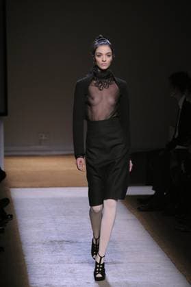 Yves Saint-Laurent Spring-Summer 2010 Ready to wear collection show in Paris Mariacarla Boscono displays a creation by designer Stefano Pilati for Yves Saint-Laurent Spring-Summer 2010 Ready-to-Wear collection show held at the Palais de Tokyo in Paris, France on October 5, 2009. Photo by Alain Gil-Gonzalez ABACAPRESS.COM Paris France  Copyright: xGil-GonzalezxAlain ABACAx 205615_037 Gil-GonzalezxAlain ABACAx 205615_037 