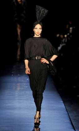 Jean-Paul Gaultier Haute Couture fashion Fall-Winter 2010 11 collection in Paris Former top model Farida Khelfa displays a creation of French designer Jean-Paul Gaultier Haute Couture fashion Fall-Winter 2010 11 collection, in Paris, France, on July 7, 2010. Photo by Christophe Guibbaud ABACAPRESS.COM Paris France  Copyright: xGuibbaudxChristophe ABACAx 237469_031 GuibbaudxChristophe ABACAx 237469_031 