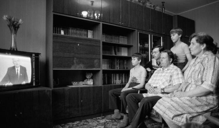 MOSCOW, USSR. May 14, 1986. The family of house-building plant No. 1 worker A. Bodrov (L-R): sons Alexander, 3rd year student of Moscow Power Engineering Institute; Sergey, Vasily; A. Bodrov and his wife, an employee of the construction plant No. 1, M. Bodrova watch the speech of the General Secretary of the CPSU Mikhail Gorbachev. Viktor Budan TASS  16457194