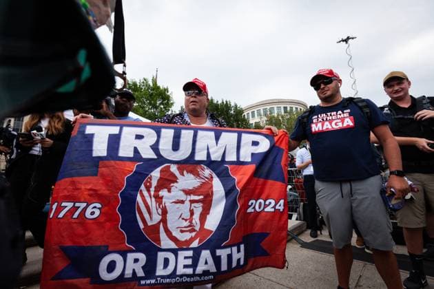Trump arraignment Trump supporters Deion (left) and Larry, of New York, speak with reporters outside the E. Barrett Prettyman Courthouse in Washington, DC, where Trump will be arraigned today for his role in the January 6, 2021 Capitol insurrection and other efforts to overturn the results of the 2020 presidential election. He is charged with conspiracies to defraud the US and obstruct an official proceeding, obstruction of a proceeding, and conspiracy to violate rights of American voters. Trump also has been charged with a hush-money scheme in New York, unlawful retention of defense information in Florida, and is under investigation for efforts to overturn the 2020 election in Georgia. He has pleaded not guilty to all charges. Washingt  Copyright: xAllisonxBaileyx originalFilename: bailey-trumparr230803_nprxd.jpg