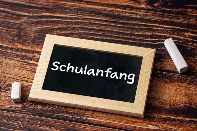 4 August 2023: Chalkboard with the inscription: Start of school. Concept of enrollment and start of school PHOTOMONTAGE *** Kreidetafel mit der Aufschrift: Schulanfang. Konzept zur Einschulung und Start der Schule FOTOMONTAGE