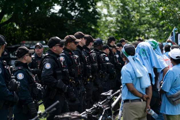 August 5, 2023, Toronto, ON, Canada: Toronto Police hold back a line of protestors in Earlscourt Park in Toronto, on Saturday, August 5 2023. Toronto police say one person was stabbed and eight others were injured during a protest in the cityöÄÃ s west end. Toronto Canada  - ZUMAc35_ 20230805_zaf_c35_042 Copyright: xArlynxMcadoreyx