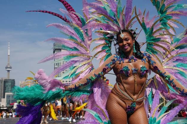 August 5, 2023, Toronto, ON, CAN: A reveller takes part in the Toronto Caribbean Carnival, on Saturday, August 5, 2023. Toronto CAN  - ZUMAc35_ 20230805_zaf_c35_092 Copyright: xChrisxYoungx