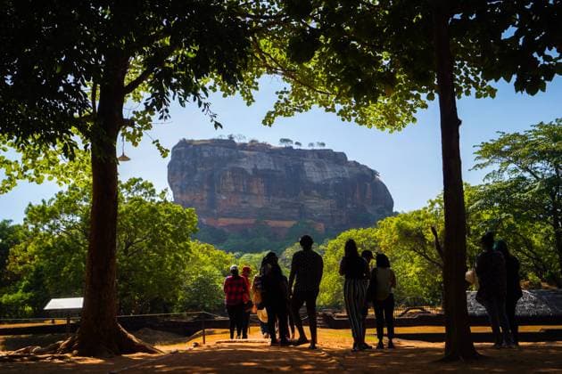 Sigiriya, The Lion Fortress Of Sri Lanka Foreign and local visitors visit to witness the Sigiriya fortress on August 6, 2023, in Dambulla, Sri Lanka. Sigiriya Lion Rock is an ancient rock fortress known for its massive column of rock that reaches nearly 200 metres high. The site dates back to the reign of King Kasyapa (4774-4795 AD), who chose this site as his new capital. He decorated the walls with frescoes and built an impressive palace right on top of the rock column, accessible only through the mouth of an enormous carved lion. It is located at a distance of 178 km from Colombo and has become a popular tourist spot for foreigners from all over the world. Dambulla Sri Lanka  Copyright: xThilinaxKaluthotagex originalFilename: kaluthotage-notitle230806_npuCu.jpg