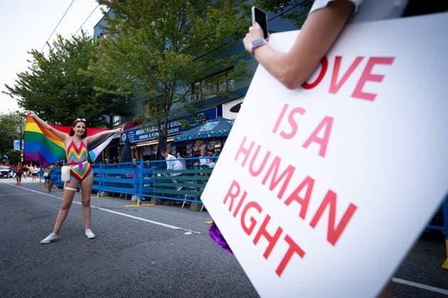 August 6, 2023, VANCOUVER, BC, CANADA: A person poses for a picture in the street during the Pride Parade at English Bay in Vancouver, B.C., Sunday, Aug. 6, 2023. VANCOUVER CANADA  - ZUMAc35_ 20230806_zaf_c35_011 Copyright: xEthanxCairnsx