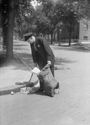 Sanitation Worker Picking up Trash in Street, USA, Harris & Ewing, 1921  Copyright: xCircaxImagesx ghi-circa01098