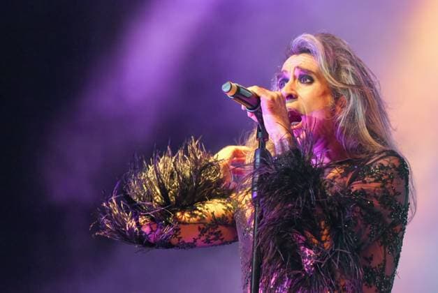 August 8, 2023, Sitges, Spain: Singer Mario Vaquerizo of Nancys Rubias performs at the Festival Jardins de terramar in Sitges. The Spanish group Nancys Rubias performed at the Festival Jardins de Terramar in Sitges in front of 2,500 people..Nancys Rubias is a glam and electronic pop group formed by the versatile artist and husband of the singer Alaska from the group Fangoria, Mario Vaquerizo singer, his sister Marta Vaquerizo drums, Miguel Balanzategui keyboards and Pedro del Moral Guitar. Sitges Spain - ZUMAs197 20230808_aaa_s197_011 Copyright: xRamonxCostax