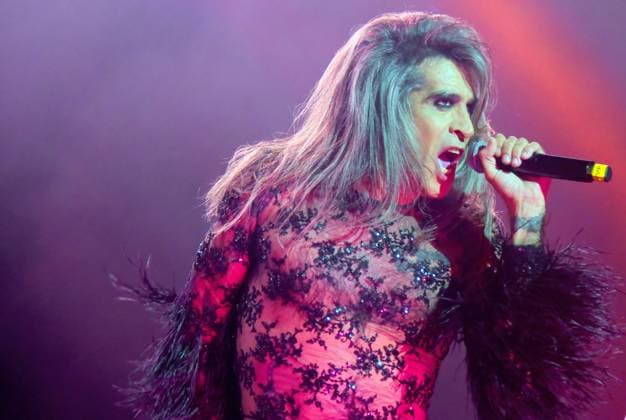 August 8, 2023, Sitges, Spain: Singer Mario Vaquerizo of Nancys Rubias performs at the Festival Jardins de terramar in Sitges. The Spanish group Nancys Rubias performed at the Festival Jardins de Terramar in Sitges in front of 2,500 people..Nancys Rubias is a glam and electronic pop group formed by the versatile artist and husband of the singer Alaska from the group Fangoria, Mario Vaquerizo singer, his sister Marta Vaquerizo drums, Miguel Balanzategui keyboards and Pedro del Moral Guitar. Sitges Spain - ZUMAs197 20230808_aaa_s197_013 Copyright: xRamonxCostax