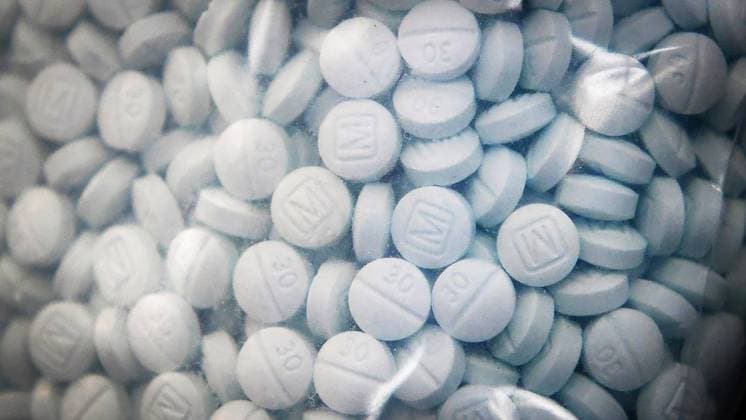 June 9, 2023: A bag of evidence containing the synthetic opioid fentanyl disguised as Oxycodone is shown during a 2020 news conference at the Fresno County Sheriff s Office in Fresno, California. - ZUMAm67_ 20230609_zaf_m67_026 Copyright: xCraigxKohlrussx
