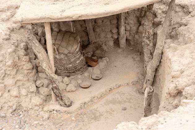 Lima, Peru. Huaca Huallamarca, restored pre-Hispanic adobe pyramid built in the 1st century B.C. Funerary bundles with false heads were made. (Editorial Use Only)  Copyright: xJanetxHortonx x SA17 JHO0001