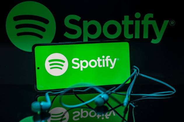 Photo Illustration Spotify Spotify logo displayed on a smart phone with Spotify seen on screen, in this photo illustration, on 15 August 2023 Brussels, Belgium. (Photo Illustration by Jonathan Raa NurPhoto) Brussels Belgium  Copyright: xJonathanxRaax originalFilename: raa-spotifyp230815_npzCf.jpg