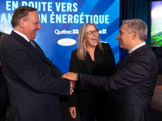 August 17, 2023, BECANCOUR, PQ, Canada: Lisa Drake, centre, vice-president of EV Industrialization for Ford Model e, speaks with Quebec Premier Francois Legault, left, and Minister of Innovation, Science and Industry Francois-Philippe Champagne following a press conference to announce the construction of a new Ford manufacturing plant in Becancour, Que., Thursday, Aug.17, 2023. BECANCOUR Canada - ZUMAc35_ 20230817_zaf_c35_003 Copyright: xChristinnexMuschix