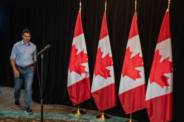 August 20, 2023, Charlottetown, PE, CANADA: Prime Minister Justin Trudeau walks to the microphone to make a statement about the wildfires in Western Canada in Charlottetown, Sunday, Aug. 20, 2023. He and the rest of his cabinet is in the city for a retreat beginning Monday. Charlottetown CANADA  - ZUMAc35_ 20230820_zaf_c35_039 Copyright: xBrianxMcinnisx