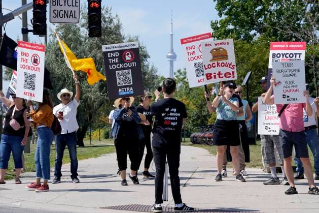 August 22, 2023, Toronto, ON, CANADA: Alliance of Canadian Cinema, Television and Radio Artists (ACTRA) workers demonstrate outside a Wendy s location in Toronto, Tuesday, Aug. 22, 2023. Wendy s is a client of McCann, one of a series of companies represented by the Institute of Canadian Agencies (ICA), which is in a labour dispute with ACTRA, who represents about 9,000 commercial actors in Canada. Toronto CANADA - ZUMAc35_ 20230822_zaf_c35_096 Copyright: xFrankxGunnx