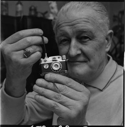 ***APRIL 19, 1973, FILE PHOTO*** Karel Zezula, head waiter at the Avion Hotel in Brno, has collected over 140 pocket and table, petrol, gas and flint lighters from Japan, Switzerland, France, Austria, Germany and Italy in 13 years. A miniature photographic instrument with built-in lighter and compass from Switzerland. (CTKxPhoto VitxKorcak) CTKPhotoF202111251522401  CTKPhotoF202111251522401