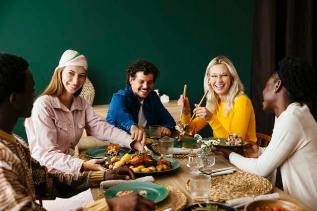 Happy friends having thanksgiving lunch at home model released, Symbolfoto property released, EBSF03722