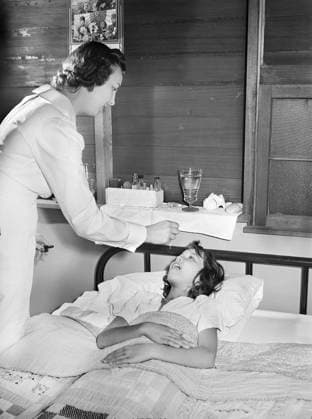 Patient receiving medical aid in health clinic, migratory labor camp, Harlingen, Texas, USA, Arthur Rothstein, U.S. Farm Security Administration, February 1942  Copyright: xCircaxImagesx ghi-circa11845