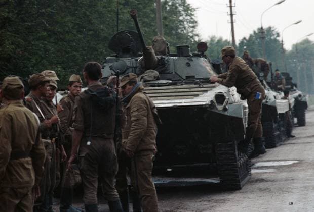 Moscow, USSR. Soldiers follow the column of the Taman Division infantry fighting vehicles in Minskoye Highway towards the place of permanent deployment after the State Committee on the State of Emergency (GKChP) failed coup attempt. In order to prevent the signing of the Union Treaty, which has to replace the USSR by the new federation of sovereign states, the representatives of top Soviet leadership, headed by Vice-President of the USSR Gennady Yanayev removed the USSR President Mikhail Gorbachev from power and declared state of emergency. Andrei Babushkin TASS  32444303