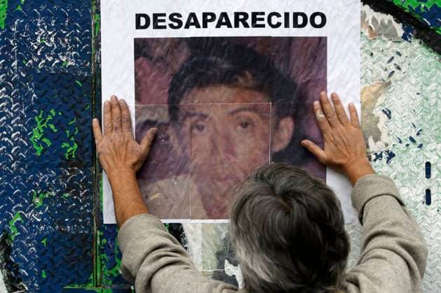 August 25, 2023, Mexico City, Mexico: Activists post photographs of victims of forced disappearance in the so-called Dirty War period in 1974 in the state of Guerrero. The protest at the Glorieta at y the Disappeared on Reforma avenue in Mexico City. on August 25, 2023 in Mexico City, Mexico Mexico City Mexico - ZUMAe321 20230825_zia_e321_006 Copyright: xLuisxBarronx