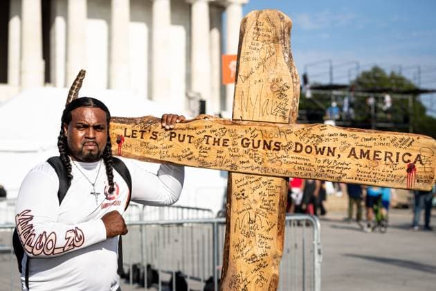 60th anniversary of the March on Washington Denorver Garrett of Louisville, KY, stands at the March on Washington with a cross bearing the names of individuals killed by gun violence. Like him, some of those names were victims of police brutality. Thousands attended the demonstration marking the 60th anniversary of the March on Washington and Dr. Martin Luther King Jr.™s I Have a Dream speech. The event was hosted by National Action Network and the Drum Major Institute to both commemorate the 1963 march and call for continued work toward racial equality in the United States. Washington DC United States  Copyright: xAllisonxBaileyx originalFilename: bailey-60thanni230826_npuUl.jpg