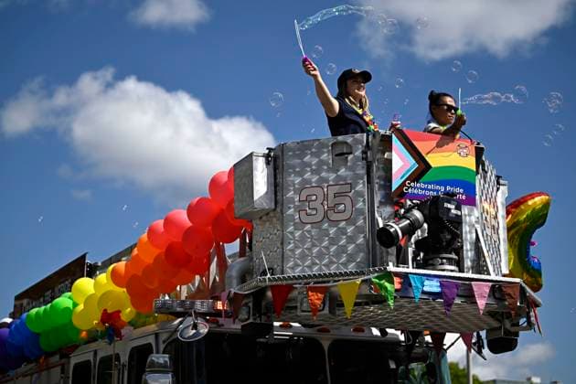 August 27, 2023, Ottawa, ON, CAN: Ottawa Firefighters blow bubbles from the ladder of a fire truck during the Capital Pride Parade in Ottawa, on Sunday, Aug. 27, 2023. Ottawa CAN  - ZUMAc35_ 20230827_zaf_c35_033 Copyright: xJustinxTangx