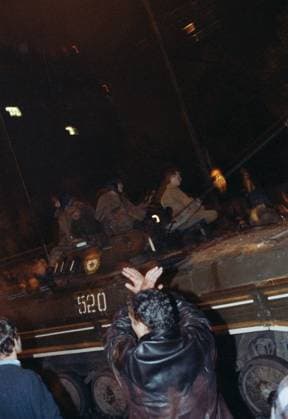 Moscow, USSR. Protesting supporters of USSR President Mikhail Gorbachev and RSFSR President Boris Yeltsin confront the Taman Division soldiers at the Tchaikovsky Tunnel on the Garden ring at night August 20-21, 1991 after the announcement of the state of emergency in the country in an attempted coup. In order to prevent the signing of the Union Treaty, which has to replace the USSR by the new federation of sovereign states, the representatives of top Soviet leadership, headed by Vice-President of the USSR Gennady Yanayev removed the USSR President from power and created the State Committee on the State of Emergency (GKChP). Andrey Solovyov TASS  32444309