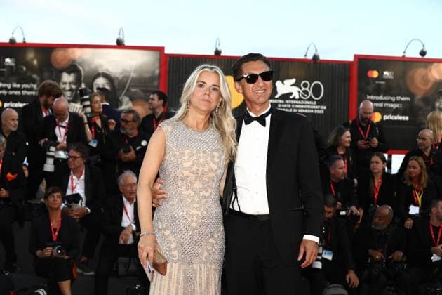 August 30, 2023, Venice, Veneto, Italy: Chairman and Chief Executive Officer of CANAL+ Group, Chairman of Studiocanal, and Chairman & CEO of Dailymotion MAXIME SAADA attends the red carpet of the Opening Ceremony of the 80th Venice Film Festival with his wife SYLVIE in Lido di Venezia, Italy Venice Italy - ZUMAc179 20230830_zep_c179_169 Copyright: xMickaelxChavetx