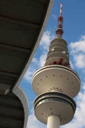 Creative Highlights World Fernsehturm TV Tower Hamburg With the right perspective, the wavy roof of the Messehallen trade fair buildings playfully hug the disks of the tv tower in Hamburg, Germany. Copyright: xZoonar.com JannisxWernerx 3664816
