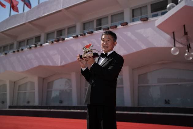Golden Lion For Lifetime Achievement Ceremony - The 80th Venice International Film Festival Tony Leung Chiu-wai attends a red carpet for the Golden Lion For Lifetime Achievement Award & The Lion s Share: A History Of The Mostra at the 80th Venice International Film Festival on September 02, 2023 in Venice, Italy Venice Italy  Copyright: xLucaxCarlinox originalFilename: carlino-notitle230902_npVeN.jpg