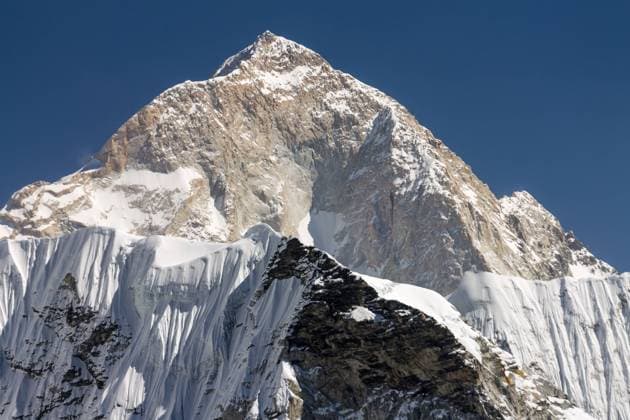 Makalu, the West Face. World s fifth highest mountain. The West Face of Makalu (8463m) seen from Chukhung Ri in the Everest Region. How do people dare to think they could climb this wall? Among those who did were Wojtek Kurtyka and Alex MacIntyre, who tried to do this alpine style in early eighties (on one occasion together with Jerzy Kukuczka). Seen here Makalu?s West Face was finally climbed in late nineties by a Russian team. Chukhung Ri, where the mountain was photographed from, is a 5550m high trekking-peak requiring no technical climbing nor equipment. Trekkers are free to climb it ? there is no licence fee for the attempt. The mountain is located in the Upper Imja Khola valley, just below the Lhotse South Face. Sagarmatha National Pa Copyright: xZoonar.com RadekxKucharskix 17328489