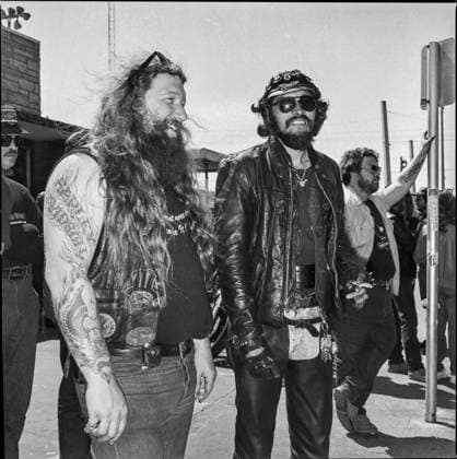 tattooed, dressed in leather bikers hanging out during Daytona Bike Week in March 1986 in Daytona Beach, Florida, United States *** tattooed, dressed in leather bikers hanging out during Daytona Bike Week in March 1986 in Daytona Beach, Florida, United States