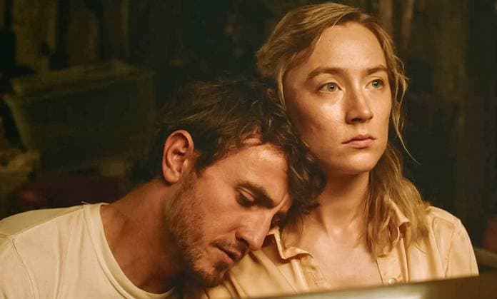 Paul Mescal and Saoirse Ronan USA. Paul Mescal and Saoirse Ronan in a scene from the (C)Amazon studios new film: Foe (2023) . Plot: Hen and Junior farm a secluded piece of land that has been in Junior s family for generations, but their quiet life is thrown into turmoil when an uninvited stranger shows up at their door with a startling proposal. LMK110-J10176-060923 