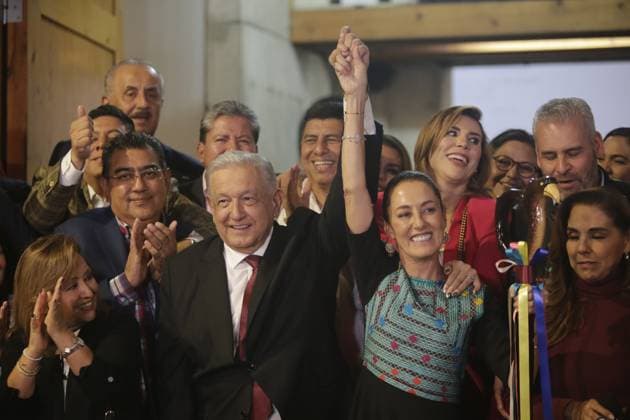 September 8, 2023, Mexico City, Mexico City, Mexico: ANDRES MANUEL LOPEZ OBRADOR president of the United Mexican States raising his hand together with CLAUDIA SHEINBAUM PARDO, at the handing over of the baton. Mexico City Mexico - ZUMAs310 20230908_zip_s310_005 Copyright: xLuisxExSalgadox