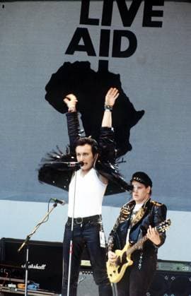 ADAM ANT British Pop Singer Former member of Adam and the Ants . On stage at the Live Aid Concert at Wembley COMPULSORY CREDIT: UPPA Photoshot Photo CGH 201858 13.07.1985 ADAM ANT British Pop Singer Former member of Adam and the Ants . On stage at the Live Aid Concert at Wembley COMPULSORY CREDIT: Starstock Photoshot Photo CGH 201858 13.07.1985, Credit:Photoshot Avalon United Kingdom  Copyright: xPhotoshotx xAvalonx 0506356633