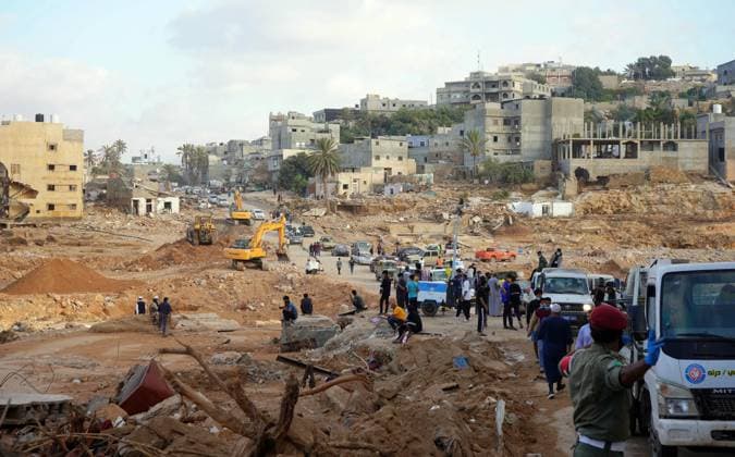 Bilder des Jahres 2023, News 09 September News Themen der Woche KW37 News Bilder des Tages (230917) -- DERNA, Sept. 17, 2023 -- Rescuers work in Derna, Libya, Sept. 16, 2023. On Sept. 10, Mediterranean storm Daniel made landfall in Libya, bringing heavy storms and flash floods along its path in the northeast of the war-torn country and causing extensive damage to residential areas and infrastructure. At least 5,500 people were dead and another 10,000 missing in the disaster, according to the official update on Wednesday. The International Organization for Migration (IOM) said on Friday that more than 38,640 people have been displaced in the most affected areas in northeastern Libya. (Photo by Xinhua) (FOCUS)LIBYA-DERNA-FLOODS-AFTERMATH HamzaxTurkia 