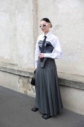September 21, 2023, Milan, Lombardia, Italy: Milan Fashion Week takes place from September 19 to 25, 2023 in Milan Italy. Fashion lovers and fashion influencers pose for photographs before the Prada fashion show. Milan Italy - ZUMAt227 20230921_zip_t227_014 Copyright: xMarinaxTakimotox