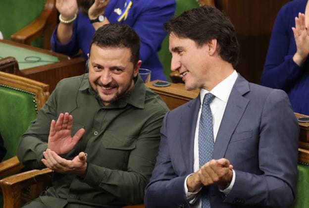 September 22, 2023, Ottawa, ON, Canada: Ukrainian President Volodymyr Zelenskyy and Prime Minister Justin Trudeau chat after delivering a speech in the House of Commons on Parliament Hill in Ottawa on Friday, Sept. 22, 2023. Ottawa Canada  - ZUMAc35_ 20230922_zaf_c35_146 Copyright: xPatrickxDoylex