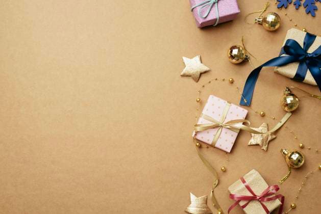 Christmas ornament and gift box on brown background. Christmas winter decoration. flat lay, top view, copy space Christmas ornament and gift box on brown background. Christmas winter decoration. flat lay, top view, copy space Copyright: xZoonar.com SangaxParkx 19511300