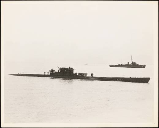 RECORD DATE NOT STATED Surrendered Kriegsmarine U-1228 Entering Portsmouth, New Hampshire under Escort. This item is a photograph depicting German submarine U-1228 entering Portsmouth, New Hampshire, where she surrendered to U.S. forces on May 17, 1945, ten days following the surrender of Germany, which ended World War II in Europe and the Atlantic. 1945-05-17T00:00:00. Northeast Region (Boston, MA). Photographic Print. Department of the Navy. First Naval District. Office of the Assistant Chief of Staff for Administration. Office of the Historical Officer. ca. 1941-ca. 1946. Administrative History of the First Naval District in World War II Copyright: xpiemagsx piemagsnarww218062023-26 !ACHTUNG AUFNAHMEDATUM GESCHÄTZT!