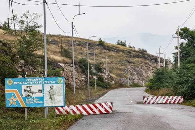 AZERBAIJAN, SHUSHA DISTRICT - SEPTEMBER 25, 2023: A sign at a checkpoint of the Russian peacekeeping force at the entrance in the Lachin Corridor. Sergei Savostyanov TASS  62631853