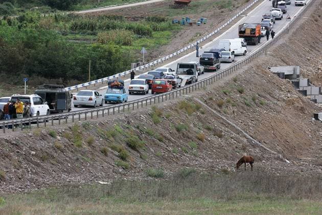 Armenia Azerbaijan Tensions Evacuees 8524986 26.09.2023 Cars carrying evacuees from Nagorno-Karabakh region wait in a line to enter the village of Kornidzor, Syunik Province, Armenia. 13,350 evacuees entered Armenia from Nagorno-Karabakh after Azerbaijan launched counterterrorism activities in the breakaway region last week, the Armenian government said on September 26. Grigoriy Pechorin Sputnik Syunik Province Armenia  Copyright: xGrigoriyxPechorinx